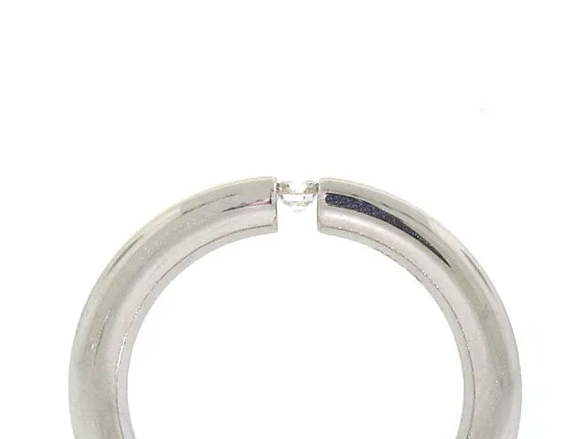 Niessing Diamond Tension Ring in 18K and Platinum